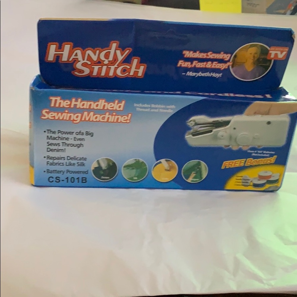 Handheld sewing machine